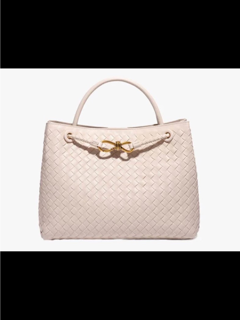 Woven cream handbag